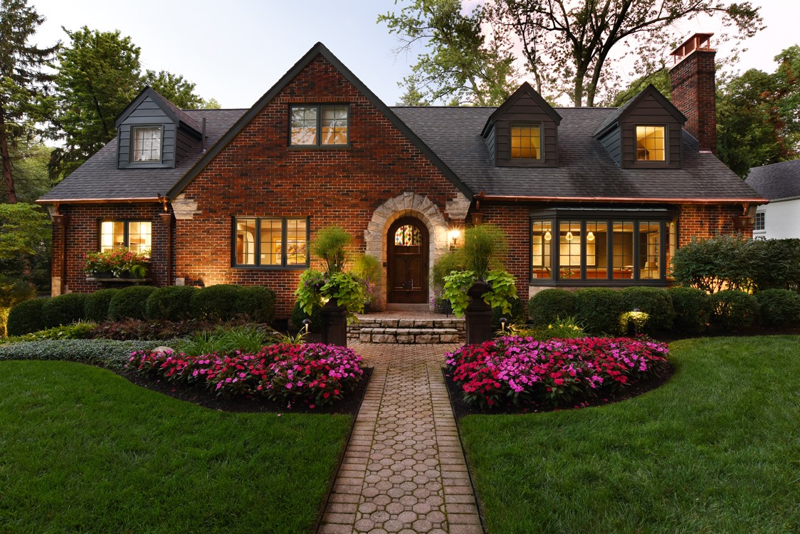 Dayton Landscaping: Charming brick house with landscaped garden